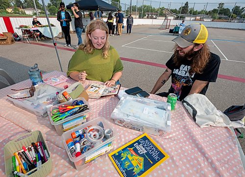 ROBERT LEE / FREE PRESS
Artist and facilitator Katie Borgfjord, who runs Scrap &amp; Yap, an arts-and-crafts collage group, is photographed at the Riverview market on Monday, August 24, 2026. 