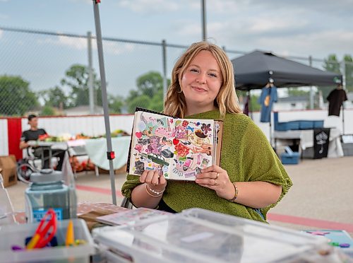 ROBERT LEE / FREE PRESS
Artist and facilitator Katie Borgfjord, who runs Scrap &amp; Yap, an arts-and-crafts collage group, is photographed at the Riverview market on Monday, August 24, 2026. 