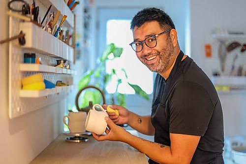 MIKE DEAL / FREE PRESS
Potter Eric Au in his home studio will be competing in a live pottery showdown at the WAG on Thursday.
Reporter: Tiago Resko
260825 - Tuesday, August 24, 2026