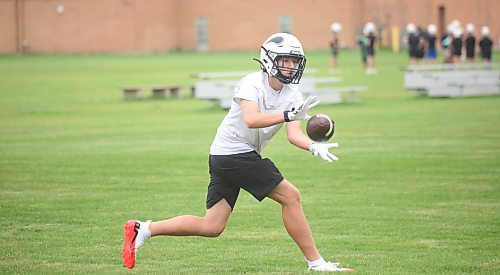 Max Ficek receives a pass at the Vincent Massey Vikings' preseason camp. (Rowan McCarthy/Brandon Sun)