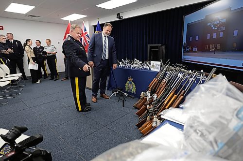 Ruth Bonneville / Free Press
Local RCMP presser
RCMP Supt. Jeff Asmundson and Manitoba Justice Minister Matt Wiebe look over the large amount of guns and drugs confiscated during a press conference at the RCMP HQ Tuesday. Manitoba RCMP released details about Project Dolar, an investigation lasting nearly two full years has resulted in a significant quantity of drugs and firearms being seized throughout Manitoba.
See story
Aug 25th,, 2026