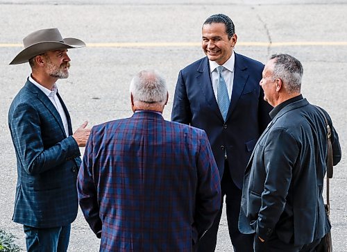 JOHN WOODS / FREE PRESS
Manitoba Metis Federation Lorne Pelletier, right, and President David Chartrand, centre, and Matthew Atkinson, left, representing Manitoba Beef Producers and Canadian Cattle Association talk with Premier Wab Kinew after they met with Manitoba business leaders, unions and indigenous leaders to discuss trade relations with the United States at the Manitoba Legislature Monday, August 24, 2026. 

reporter: gabby