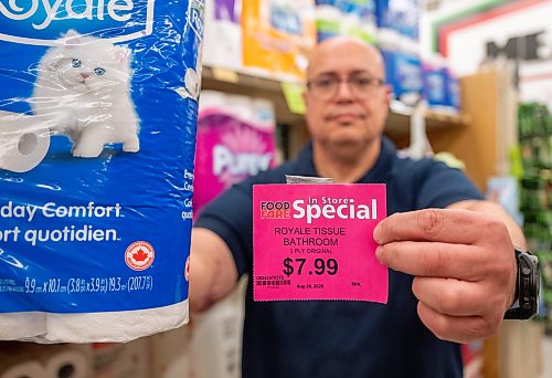ROBERT LEE / FREE PRESS
Owner of Maryland Food Fare, Ramsey Zeid, points to “Made in Canada” labels to highlight which brands he hopes customers will support amid higher prices driven by counter-tariffs on a swath of U.S. goods, in Winnipeg on Tuesday, Aug. 25, 2026.