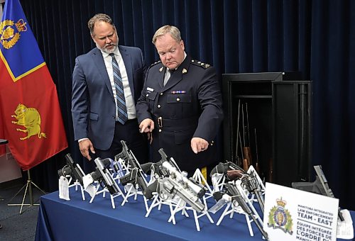 Ruth Bonneville / Free Press
Local RCMP presser
RCMP Supt. Jeff Asmundson and Manitoba Justice Minister Matt Wiebe look over the large amount of guns and drugs confiscated during a press conference at the RCMP HQ Tuesday. Manitoba RCMP released details about Project Dolar, an investigation lasting nearly two full years has resulted in a significant quantity of drugs and firearms being seized throughout Manitoba.
See story
Aug 25th,, 2026