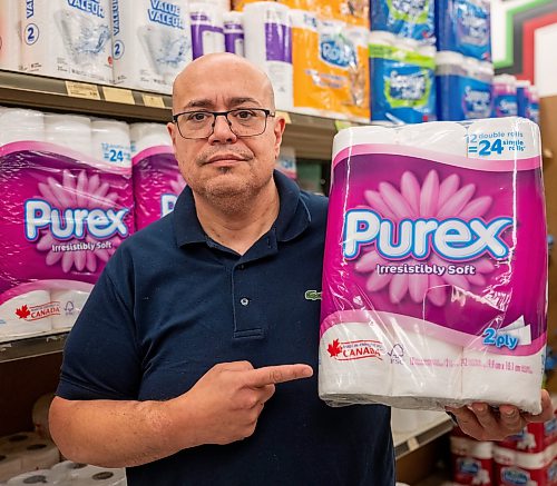 ROBERT LEE / FREE PRESS
Owner of Maryland Food Fare, Ramsey Zeid, points to “Made in Canada” labels to highlight which brands he hopes customers will support amid higher prices driven by counter-tariffs on a swath of U.S. goods, in Winnipeg on Tuesday, Aug. 25, 2026.