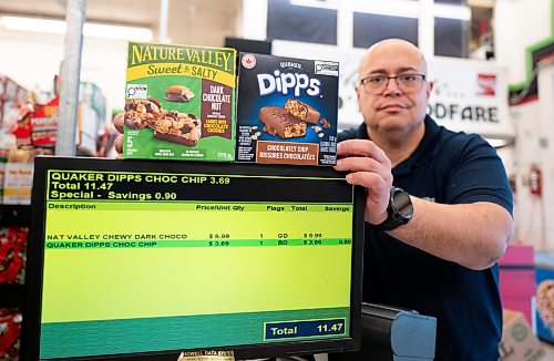 ROBERT LEE / FREE PRESS
Owner of Maryland Food Fare Ramsey Zeid shows the difference in pricing due to the counter tariffs placed on a swath of U.S. goods in Winnipeg on Tuesday, August 25, 2026. 