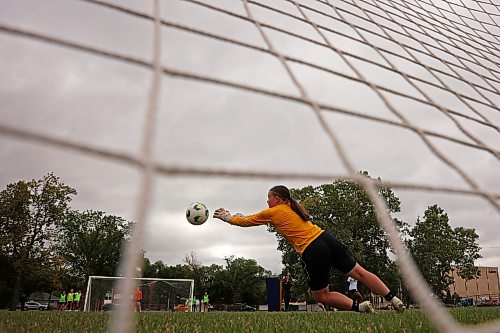 25082026
Goalkeeper Rebecca Collier blocks a shot on net as the Brandon University Bobcats women’s soccer team takes part in preseason training at the university on Tuesday morning. The Bobcats start their season on September 12 with their home-opener.  (Tim Smith/The Brandon Sun)