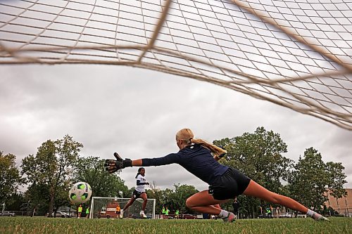 25082026
Goalkeeper dives to block a shot on net as the Brandon University Bobcats women’s soccer team takes part in preseason training at the university on Tuesday morning. The Bobcats start their season on September 12 with their home-opener.  (Tim Smith/The Brandon Sun)
