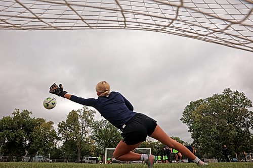 25082026
Goalkeeper dives to block a shot on net as the Brandon University Bobcats women’s soccer team takes part in preseason training at the university on Tuesday morning. The Bobcats start their season on September 12 with their home-opener.  (Tim Smith/The Brandon Sun)