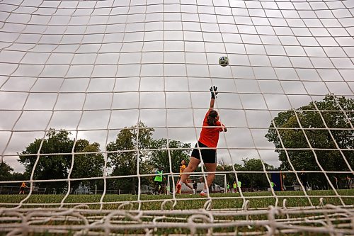 25082026
Goalkeeper Casey Lamoureax deflects a shot on net as the Brandon University Bobcats women’s soccer team takes part in preseason training at the university on Tuesday morning. The Bobcats start their season on September 12 with their home-opener.  (Tim Smith/The Brandon Sun)