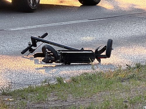 MORGAN MODJESKI / FREE PRESS
Family members on scene say a 13-year-old girl was taken to hospital after she was hit by a sedan at a crosswalk near Jefferson Avenue and Watson Street on Tuesday evening, Aug. 25, 2026. Family members say the child was travelling north on a multi-use trail and was hit by a car travelling westbound on Jefferson Ave. and they were waiting for an update on her condition. Police were on scene, keeping an eye on a badly-damaged scooter and a car with a smashed windshield.