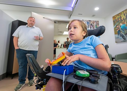 ROBERT LEE / FREE PRESS
Braelynn Bodman enjoys some time playing XBOX using custom controllers as seen in the Smart Suite officially opened today at the Rehabilitation Centre for Children in Winnipeg on Wednesday, August 26, 2026. The Smart Suite helps children with disabilities gain greater independence at home.
