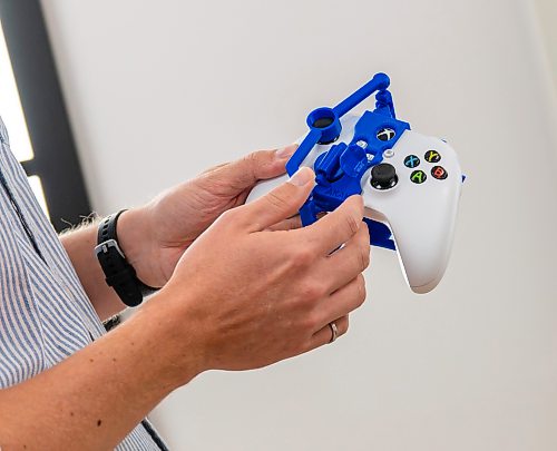 ROBERT LEE / FREE PRESS
Shea Hunt, Manager, Electronic Engineering, Rehabilitation Centre for Children, explains the adaptations made for a XBOX controller in the new Smart Suite at the Rehabilitation Centre for Children in Winnipeg on Wednesday, August 26, 2026. The Smart Suite helps children with disabilities gain greater independence at home.