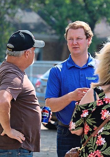 Brandon-Souris MP Grant Jackson speaks with residents during a community barbecue he hosted on Wednesday at the East End Community Centre. Jackson says he has received a lot of questions from residents about the ongoing trade war between Canada and the U.S. (Rylee Gerrard/The Brandon Sun)