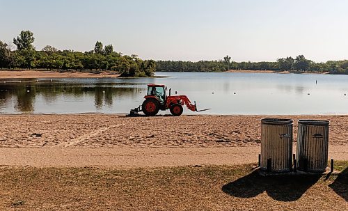 MIKE DEAL / FREE PRESS
A tractor scrapes the beach in St. Malo Provincial Park cleaning away goose feces in an attempt to reduce E. coli in the water.
Reporter: Melissa Martin
260821 - Friday, August 21, 2026.