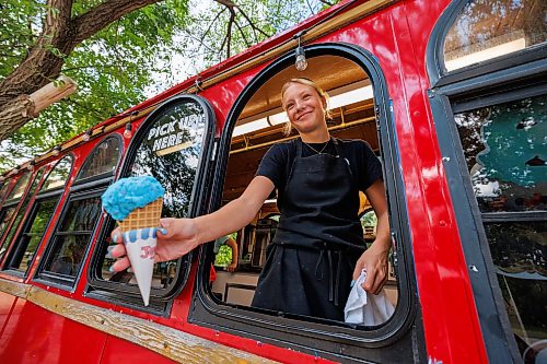 MIKE DEAL / FREE PRESS
Annika Peetsma holds out an ice cream for a customer at The Barefoot Cafe in St. Malo Provincial Park.
Reporter: Melissa Martin
260821 - Friday, August 21, 2026.
