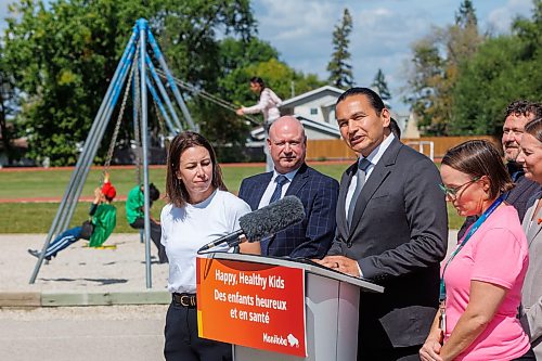 MIKE DEAL / FREE PRESS
Premier Wab Kinew and Education and Early Childhood Learning Minister Tracy Schmidt announces that the government is introducing a pilot program for a new health and physical education curriculum that includes an a policy making in-person physical education mandatory for all students from kindergarten to Grade 12.
The press conference held on the playground of Victor Mager School, included other stake holders who spoke; Dr. Brent Roussin, chief provincial public health officer, Jason Cline, superintendent, Rolling River School Division, Alyson Gysel, co-president, Physical Health Educators of Manitoba, and Noelle Depape, president and CEO, Boys and Girls Club Winnipeg.
Reporter: Maggie Macintosh
260827 - Thursday, August 27, 2026.