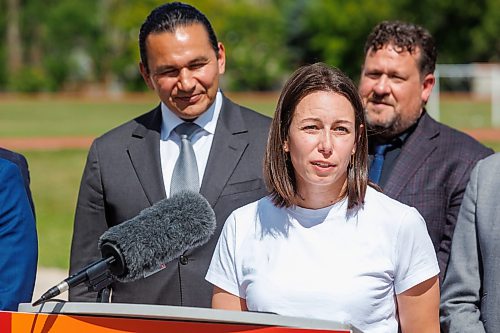 MIKE DEAL / FREE PRESS
Alyson Gysel, co-president, Physical Health Educators of Manitoba, speaks during the announcement.
Premier Wab Kinew and Education and Early Childhood Learning Minister Tracy Schmidt announces that the government is introducing a pilot program for a new health and physical education curriculum that includes an a policy making in-person physical education mandatory for all students from kindergarten to Grade 12.
The press conference held on the playground of Victor Mager School, included other stake holders who spoke; Dr. Brent Roussin, chief provincial public health officer, Jason Cline, superintendent, Rolling River School Division, Alyson Gysel, co-president, Physical Health Educators of Manitoba, and Noelle Depape, president and CEO, Boys and Girls Club Winnipeg.
Reporter: Maggie Macintosh
260827 - Thursday, August 27, 2026.