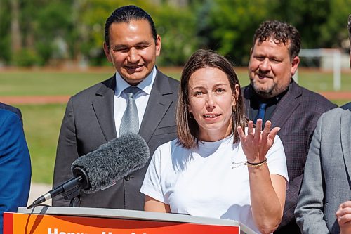 MIKE DEAL / FREE PRESS
Alyson Gysel, co-president, Physical Health Educators of Manitoba, speaks during the announcement.
Premier Wab Kinew and Education and Early Childhood Learning Minister Tracy Schmidt announces that the government is introducing a pilot program for a new health and physical education curriculum that includes an a policy making in-person physical education mandatory for all students from kindergarten to Grade 12.
The press conference held on the playground of Victor Mager School, included other stake holders who spoke; Dr. Brent Roussin, chief provincial public health officer, Jason Cline, superintendent, Rolling River School Division, Alyson Gysel, co-president, Physical Health Educators of Manitoba, and Noelle Depape, president and CEO, Boys and Girls Club Winnipeg.
Reporter: Maggie Macintosh
260827 - Thursday, August 27, 2026.