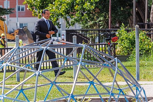 MIKE DEAL / FREE PRESS
Premier Wab Kinew arrives for the press conference walking past a playground at Victor Mager School.
Premier Wab Kinew and Education and Early Childhood Learning Minister Tracy Schmidt announces that the government is introducing a pilot program for a new health and physical education curriculum that includes an a policy making in-person physical education mandatory for all students from kindergarten to Grade 12.
The press conference held on the playground of Victor Mager School, included other stake holders who spoke; Dr. Brent Roussin, chief provincial public health officer, Jason Cline, superintendent, Rolling River School Division, Alyson Gysel, co-president, Physical Health Educators of Manitoba, and Noelle Depape, president and CEO, Boys and Girls Club Winnipeg.
Reporter: Maggie Macintosh
260827 - Thursday, August 27, 2026.