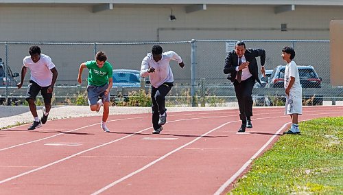 MIKE DEAL / FREE PRESS
Premier Wab Kinew runs a race with the kids from the BGC (Boys and Girls Club) of Winnipeg after the announcement.
Premier Wab Kinew and Education and Early Childhood Learning Minister Tracy Schmidt announces that the government is introducing a pilot program for a new health and physical education curriculum that includes an a policy making in-person physical education mandatory for all students from kindergarten to Grade 12.
The press conference held on the playground of Victor Mager School, included other stake holders who spoke; Dr. Brent Roussin, chief provincial public health officer, Jason Cline, superintendent, Rolling River School Division, Alyson Gysel, co-president, Physical Health Educators of Manitoba, and Noelle Depape, president and CEO, Boys and Girls Club Winnipeg.
Reporter: Maggie Macintosh
260827 - Thursday, August 27, 2026.