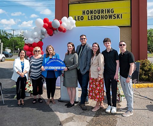 ROBERT LEE / FREE PRESS
Councillor Janice Lukes (blue blazer) and Lea Ledohowski (green dress), Leo’s daughter and President of Canad Inns, unveil the signage for “Leo Ledohowski Way”, surrounded by the Ledohowski family at the honourary street naming recognizing the Canad Inns founder’s contributions to the city at Canad Inns Destination Centre Garden City in Winnipeg on Thursday, August 27, 2026.