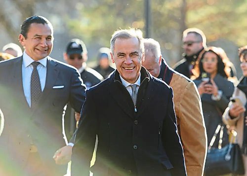 Prime Minister Mark Carney walks along side Manitoba Premier Wab Kinew and MMF president David Chartrand during an unrelated event Sunday morning prior to the Port of Churchill announcement. (Mike Sudoma/Winnipeg Free Press files)