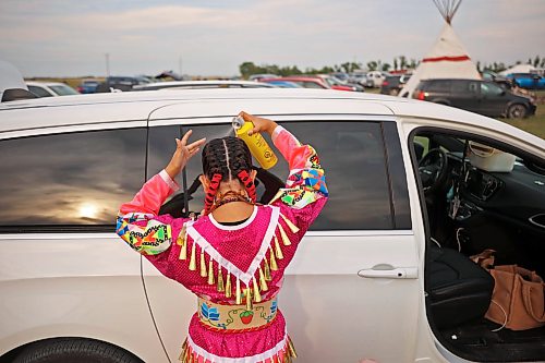 28082026
Jingle dancer Tessa Snake of east of Toronto uses hair spray while getting ready for the grand entry and jingle dancer events at the opening evening of the Birdtail Sioux Dakota Nation Powwow on Friday. The powwow marked the nation’s first powwow in 15 years and is being held all weekend at Birdtail’s brand new powwow arbor. The event brings in dancers, drummers and spectators from near and far.
(Tim Smith/The Brandon Sun)