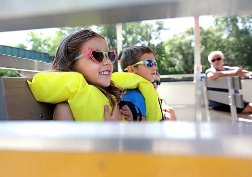 Ruth Bonneville / Free Press

Standup - Forks River Tour 

Six-year-old Amelia Manson excitedly waits for the tour  boat to leave the dock as her brother Max Manson (8yrs) is beside her as they take their first boat ride with their  extended family with Winnipeg Waterways tour boat at the Forks docks Monday.  

Winnipeg Waterways offers scenic river boat tours and seasonal water bus transit along the Red and Assiniboine Rivers, departing from The Forks Historic Port. The Water Bus ends Sept 13 but the tour boats will be running until Oct 4th this year. 


Aug 28th,,  2026