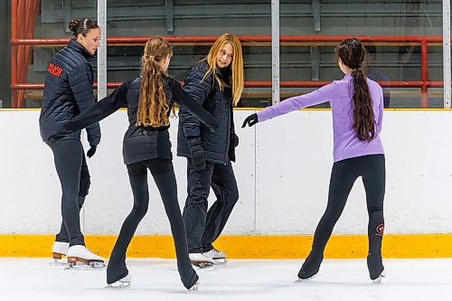 MIKE DEAL / FREE PRESS
Dana (centre) and Marrin McKee (left), mother-daughter figure skating coach’s during a training session with young figure skaters, Kaylee Kirkpatrick (purple top), 13, and Makayla Heshka, 12, Thursday morning at Dakota Community Centre.
Marrin has been skating all of her life, growing up with her mother as her coach and continuing to compete nationally into her adult years.
Reporter: Grace Penner
260820 - Thursday, August 20, 2026.