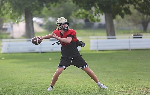 Jake Cory loads up to throw the ball at practice yesterday. The Grade 10 quarterback looked good in preseason and is ready to step into the starting role. (Rowan McCarthy/The Brandon Sun)