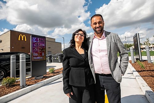 MIKAELA MACKENZIE / FREE PRESS
Amit Kapoor, operator/franchisee of the first drive-thru-only McDonald's restaurant in Canada, with his wife Bharti Kapoor at the Kenaston location on Wednesday, Sept. 2, 2026.
For Aaron Epp story.
Free Press 2026