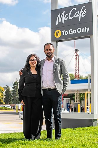 MIKAELA MACKENZIE / FREE PRESS
	
Amit Kapoor, operator/franchisee of the first drive-thru-only McDonald's restaurant in Canada, with his wife Bharti Kapoor at the Kenaston location on Wednesday, Sept. 2, 2026.

For Aaron Epp story.
Free Press 2026