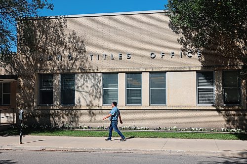 A man walks in front of the Brandon Land Titles Office on Princess Avenue on Friday. Teranet Manitoba is moving the office from its downtown location to a new site on 18th Street. (Abiola Odutola/The Brandon Sun)