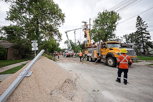 Ruth Bonneville / Free Press
Local storm repairs
Manitoba Hydro crews work to repair several hydro poles that snapped or fell down after a severe storm tore through the River Heights area at approximately 6:30 p.m. on Sunday. Homes and business in the area around Lindsay and Borebank street are still out of power.
See story by Malak
Sept 8th, 2026