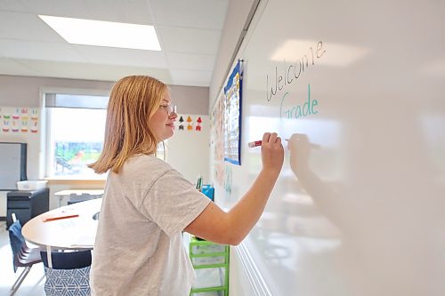Grade 1 teacher Brianna Clark writes a greeting on the white board in her brand new classroom at Maryland Park School in preparation for the student open house on Tuesday afternoon. Now in her second year of teaching, Clark says she is excited to have her own dedicated classroom space at the school just in time for the start of the new school year, which starts today within the Brandon School Division. The Manitoba government expanded the school by 14 new classrooms over the last year, increasing the school’s capacity to 900 students. Ms. Clark’s class will have 18 students this year. (Matt Goerzen/The Brandon Sun)