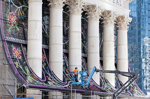 Ruth Bonneville / Free Press

ENT - Metis / Main

Photo of the  massive metal chain screen featuring a traditional floral Métis beadwork design is being installed on the facade of Winnipeg's historic Bank of Montreal building at Portage and Main.

The Artist: Created by renowned Red River Métis artist Jennine Krauchi.


Reporter: Conrad Sweatman 

Sept 9th,   2026