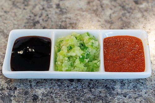 MIKE DEAL / FREE PRESS
Hainanese Chicken Rice (soy paste, scallion ginger, chili sauce)
Malvin Soh is busy prepping for his pop-up restaurant Sedap Singapore Kitchen. Soh is excited to introduce Winnipeggers to the spicy, complex and delicious flavours of the small island nation.
Reporter: AV Kitching
260910 - Thursday, September 10, 2026.