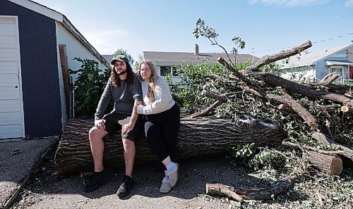 Ruth Bonneville / Free Press

 LOCAL - River Heights tornado

Photo of Lindsay street resident Tanner Lemieux with his wife Cassidy Lemieux, in the back yard where huge trees were thrown around during Sunday’s storm.  

Story: It was confirmed today that a tornado touched down during a wild storm in River Heights Sunday night. Tanner Lemieux, whose door camera footage helped the northern tornadoes project nail down the time of the storm. He made it into his house minutes before his neighbour's car flipped due to the heavy winds.

See story by Malak 

Sept 10th,   2026