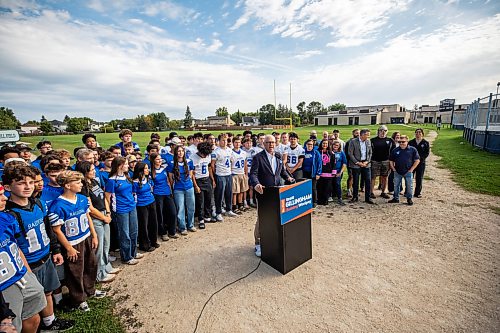 MIKAELA MACKENZIE / FREE PRESS
	
Scott Gillingham makes a campaign announcement promising to invest in turf fields with Oak Park Raiders players behind him on Friday, Sept. 11, 2026.

For Malak story.
Free Press 2026