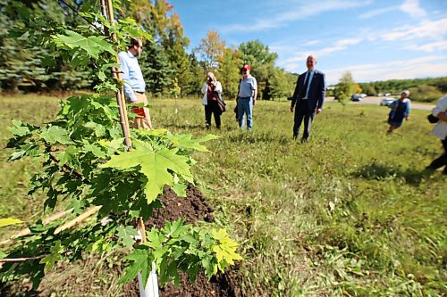 The first of 15 Canadian maple trees is planted at the International Peace Garden on Friday afternoon, following a ceremony marking the 25th anniversary of the Sept. 11, 2001 terrorist attack on the United States. The trees are part of a gift of 250 maple trees given to the United States on July 4 by Canadian Prime Minister Mark Carney as a special birthday present for the country’s 250th anniversary. Several of the trees were planted in Washington, D.C., with the remaining trees planted across the 13 American states that share an international border with Canada. (Matt Goerzen/The Brandon Sun)