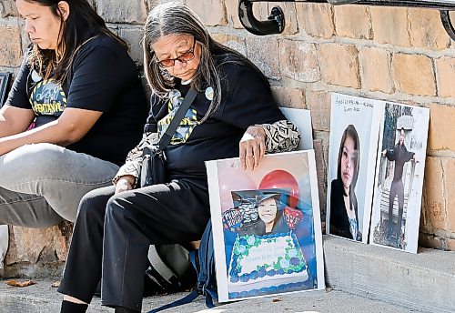 JOHN WOODS / FREE PRESS
A woman places photos of a loved one as people participate in the Fentanyl Awareness Day Walk from the Forks to the legislature Sunday, September 13, 2026.
reporter: marsha