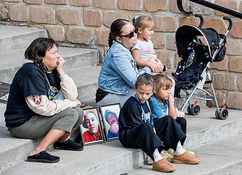 JOHN WOODS / FREE PRESS
Andrea Palamer, left, with photos of her son Colin Benoit who died, June 8, 2025 sits with her family as people participate in the Fentanyl Awareness Day Walk from the Forks to the legislature Sunday, September 13, 2026.
reporter: marsha