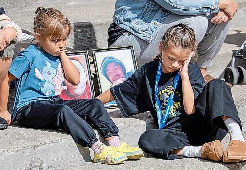 JOHN WOODS / FREE PRESS
Colin Benoit, who died June 8, 2025, is seen in photographs with his nieces as people participate in the Fentanyl Awareness Day Walk from the Forks to the legislature Sunday, September 13, 2026.

reporter: marsha