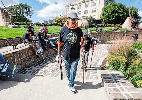 JOHN WOODS / FREE PRESS
Joseph Foure and people participate in the Fentanyl Awareness Day Walk from the Forks to the legislature Sunday, September 13, 2026.
reporter: marsha