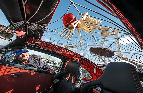 JOHN WOODS / FREE PRESS
Doug Westhouse checks out the Spiderman skeleton on the roof of his 1958 VW Bug at the Flashback 50s Annual Car Show at the Red River Exhibition Park Sunday, September 13, 2026.
reporter: standup