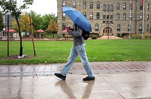 Ruth Bonneville / Free Press
Weather standup - Umbrella weather
With rainy weather in the forecast throughout the day today, a person walks with an umbrellas along Portage Ave. in front of the University of Winnipeg in the rain Monday afternoon.
Sept 14th, 2026