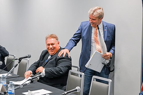 Mike Sudoma/Free Press
Mayoral Candidates Kevin Klein and Mike Vogiatzakis share a moment prior to the Mayoral Debate at Union Centre held by the Amalgamated Transit Union Monday evening
September 14, 2026