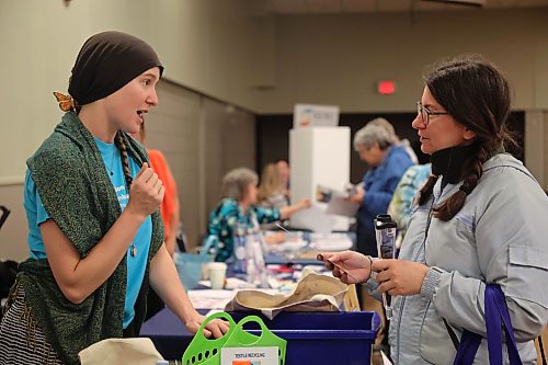 Attendees at the Health Checks expo are given the opportunity to sort household items into garbage, recycling or hazardous waste for prizes. (Rylee Gerrard/The Brandon Sun)