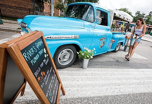 JOHN WOODS / FREE PRESS
Magwyer Herring, who sells her flowers from a 1958 Chevy Apache at markets, was out selling her goods on Corydon Sunday, September 6, 2026.

reporter: dave